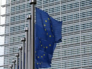Photo of EU flags as EU-funded initiative CERTAIN aims to drive ethical AI compliance in Europe amid increasing regulations like the EU AI Act.
