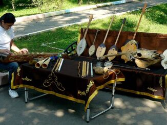A vendor selling musical instruments rural part of the Russian Republic of Khakassia.