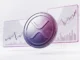 XRP coin with purple-magenta gradient lighting and abstract price chart visualization in studio setting